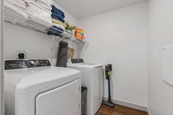 Laundry room with shelves